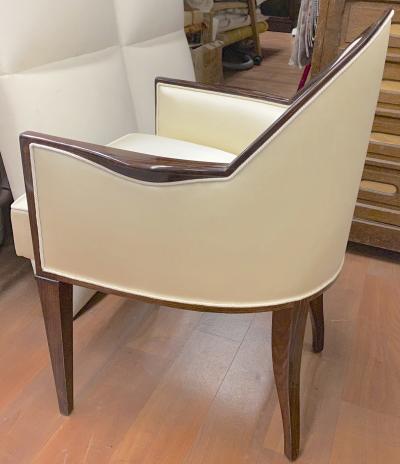  mile Jacques Ruhlmann J E Ruhlmann pair of refined solid Makassar arm chairs covered in satin silk