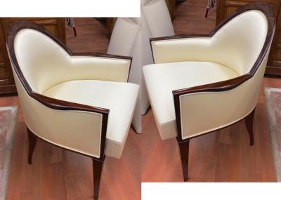  mile Jacques Ruhlmann J E Ruhlmann pair of refined solid Makassar arm chairs covered in satin silk