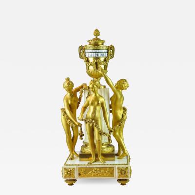  tienne Maurice Falconetv A Fine Louis XVI Style Gilt Bronze and White Marble Mantel Clock