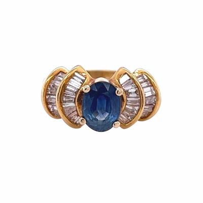 1 19 Carat Oval Cut Blue Sapphire with Baguette Cut Diamonds in 14k Gold Ring