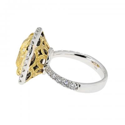 10 CARAT CUSHION CUT DIAMOND FANCY INTENSE YELLOW GIA HALO RING