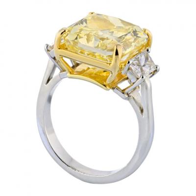 10 CARAT RADIANT CUT DIAMOND FANCY INTENSE YELLOW GIA TRAPS ON SIDE RING