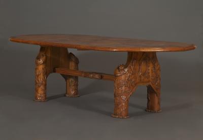 11140 AN INTERESTING CARVED OAK ARTS AND CRAFTS PERIOD LIBRARY OR CENTER TABLE