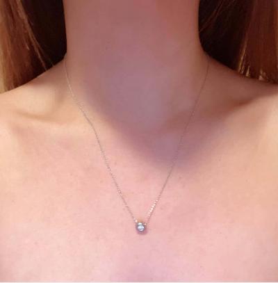 14 Karat White Gold Fancy Necklace with Diamond Pendant