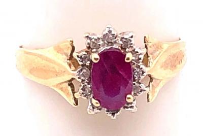 14 Karat Yellow Gold Free Form Ruby Center with Diamond Accents Ring