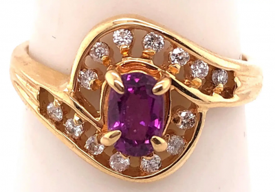 14 Karat Yellow Gold Purple Peridot Ring with Round Diamond Accents 0 14 TDW