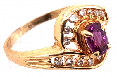 14 Karat Yellow Gold Purple Peridot Ring with Round Diamond Accents 0 14 TDW