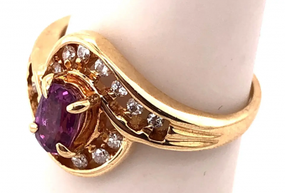 14 Karat Yellow Gold Purple Peridot Ring with Round Diamond Accents 0 14 TDW