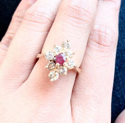 14 Karat Yellow Gold Ruby Center Framed In Diamonds Ring