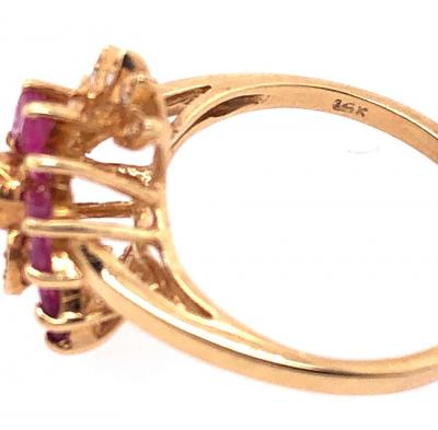 14 Karat Yellow Gold Ruby and Diamond Swirl Ring