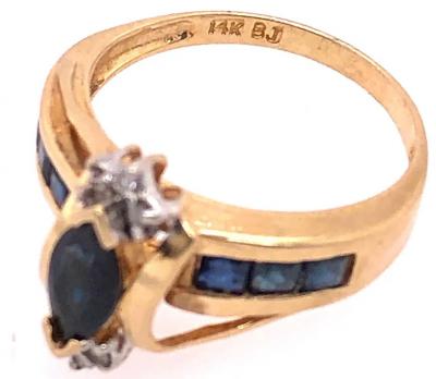 14 Karat Yellow Gold Sapphire Ring with Diamond Accents