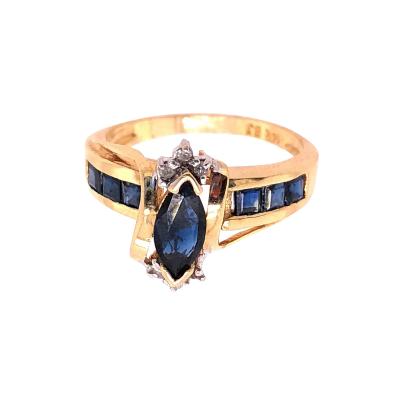 14 Karat Yellow Gold Sapphire Ring with Diamond Accents