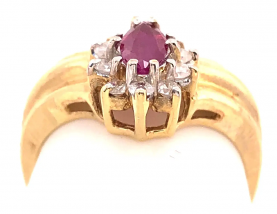 14 Karat Yellow and White Gold Ruby Ring with Diamond Accents 0 50 TDW