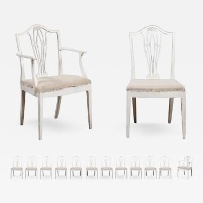 14 Swedish 1910s Painted Dining Chairs with Carved Splats and Tapered Legs
