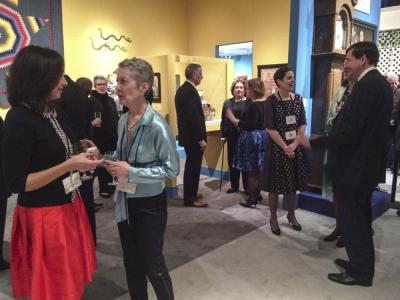 Loan exhibit featuring the Abby Aldrich Rockefeller Folk Art Museum, Colonial Williamsburg Foundation. Left foreground: Robyn Liverant (Robyn Liverant P.R.) and Janine Skerry (silver curator, Williamsburg); Right foreground: Suzanne Hood (ceramics/glass curator, Williamsburg) and Dean Lahikainen (curator, Peabody Essex Museum); rear center: Elizabeth Stillinger (author/scholar).