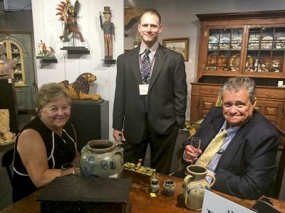 Eric Kramer of Greg Kramer Antiques (center), with longtime friends and collectors.