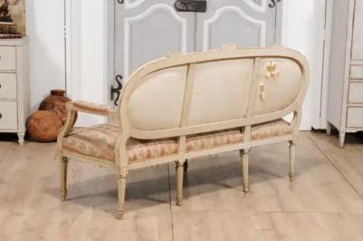 1790s Louis XVI Period French Painted Sofa with Oval Back and Carved Foliage