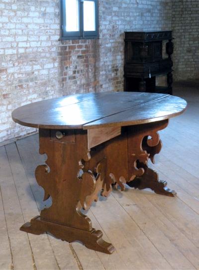 17th Century Italian Baroque Walnut Oval Drop Leaf Table