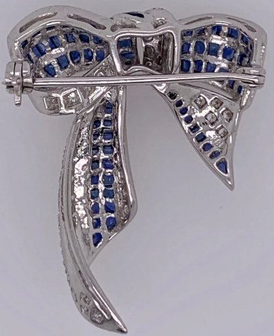 18 Karat White Gold Sapphire and Diamond Bow Pin 1 10 TDW