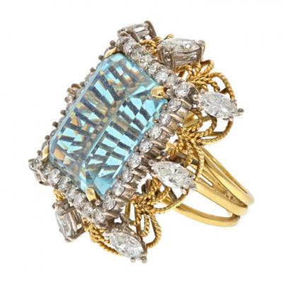 18K YELLOW GOLD EMERALD CUT AQUAMARINE AND DIAMOND HALO RING