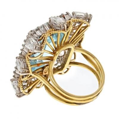 18K YELLOW GOLD EMERALD CUT AQUAMARINE AND DIAMOND HALO RING