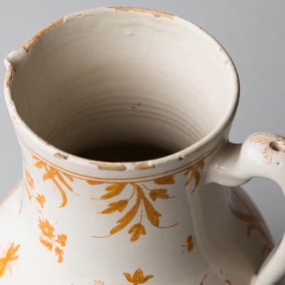 18TH CENTURY MOUSTIERS COVERED FAIENCE JUG