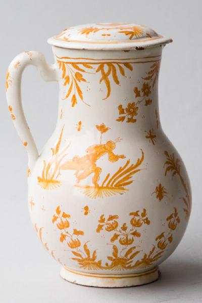 18TH CENTURY MOUSTIERS COVERED FAIENCE JUG