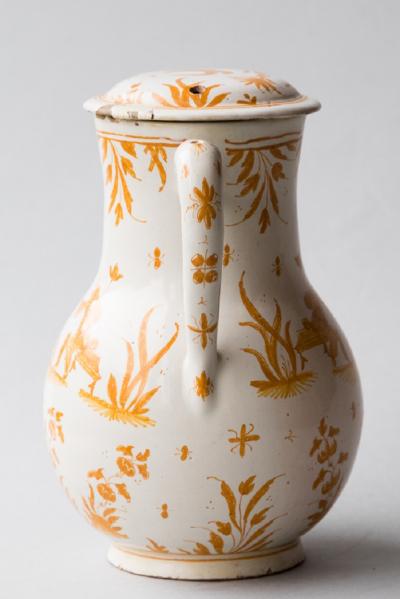 18TH CENTURY MOUSTIERS COVERED FAIENCE JUG