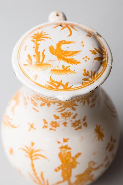 18TH CENTURY MOUSTIERS COVERED FAIENCE JUG