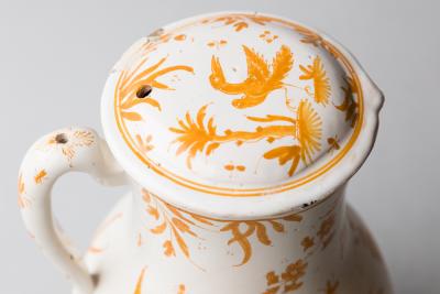 18TH CENTURY MOUSTIERS COVERED FAIENCE JUG