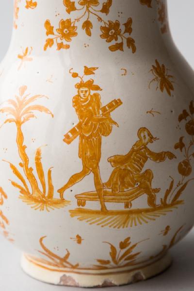 18TH CENTURY MOUSTIERS COVERED FAIENCE JUG