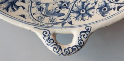 18th CENTURY SPANISH OR PORTUGUESE FAIENCE TWO HANDLED COLANDER
