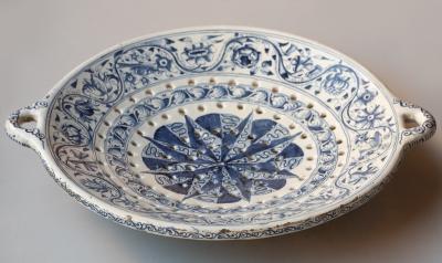 18th CENTURY SPANISH OR PORTUGUESE FAIENCE TWO HANDLED COLANDER