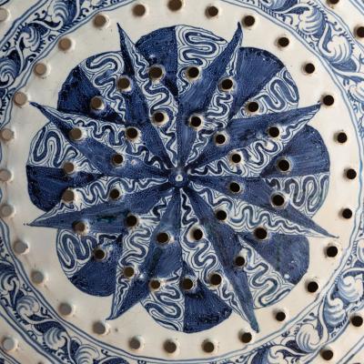 18th CENTURY SPANISH OR PORTUGUESE FAIENCE TWO HANDLED COLANDER