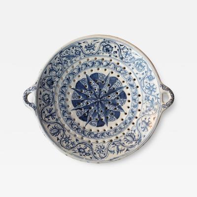 18th CENTURY SPANISH OR PORTUGUESE FAIENCE TWO HANDLED COLANDER