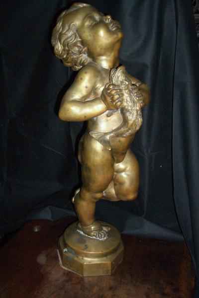18th Century Bronze Sculpture of a child Putto with Dolphin