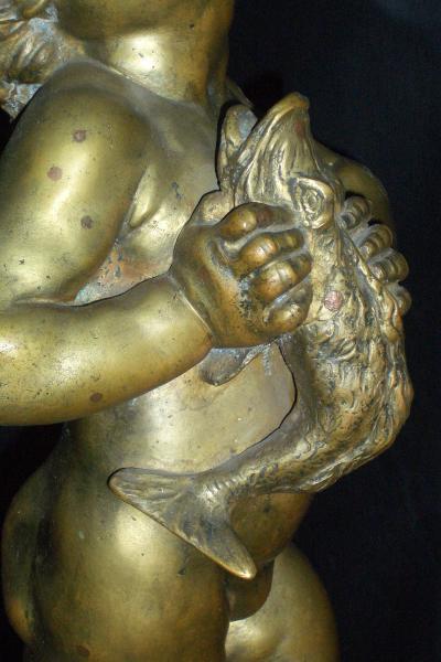 18th Century Bronze Sculpture of a child Putto with Dolphin