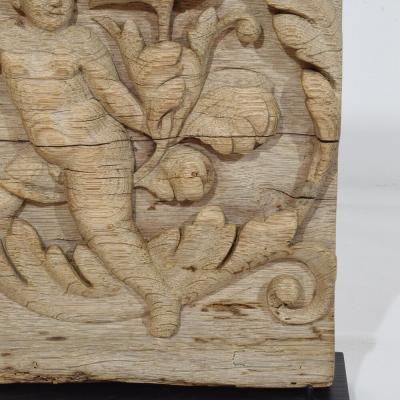 18th Century French Carved Oak Panel Depicting An Angel On An Acanthus Curl