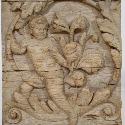 18th Century French Carved Oak Panel Depicting An Angel On An Acanthus Curl