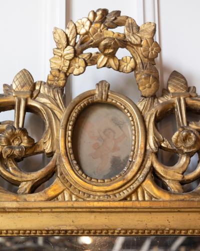 18th Century French Louis XVI Giltwood Mirror with Cherub Medallion