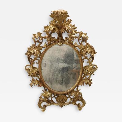 18th Century Italian Baroque Carved Gilded Wood Oval Wall Mirror