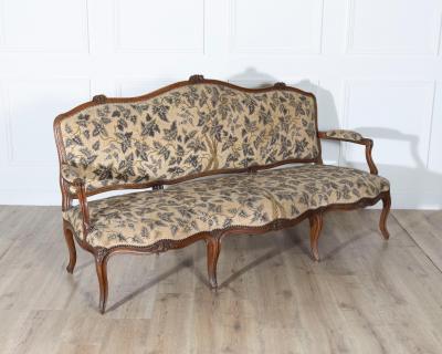 18th Century Louis XV Period Walnut Sofa with Floral Carvings and Tapestry Uphol