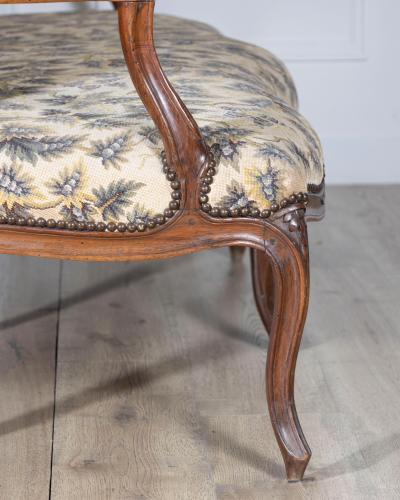 18th Century Louis XV Period Walnut Sofa with Floral Carvings and Tapestry Uphol