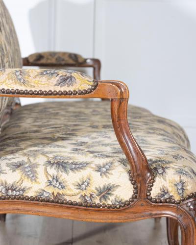 18th Century Louis XV Period Walnut Sofa with Floral Carvings and Tapestry Uphol