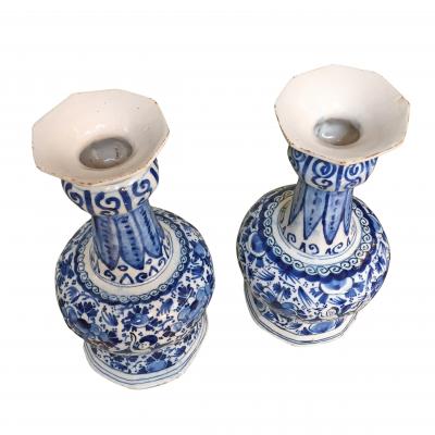 18th century Dutch Delft vases with cupids and flowers