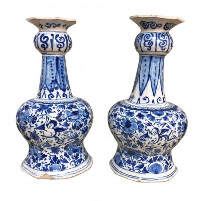 18th century Dutch Delft vases with cupids and flowers