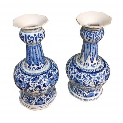 18th century Dutch Delft vases with cupids and flowers