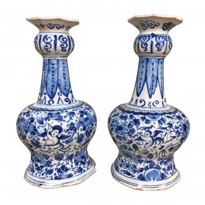 18th century Dutch Delft vases with cupids and flowers