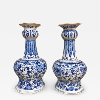 18th century Dutch Delft vases with cupids and flowers