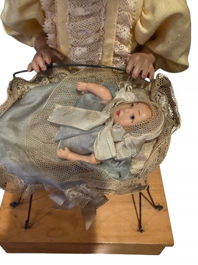 1900s FRENCH BISQUE MOTHER DOLL ROCKING BABY IN BASSINET MUSICAL AUTOMATON